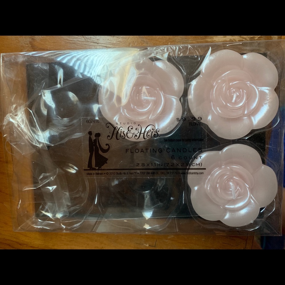 3 floating rose candles